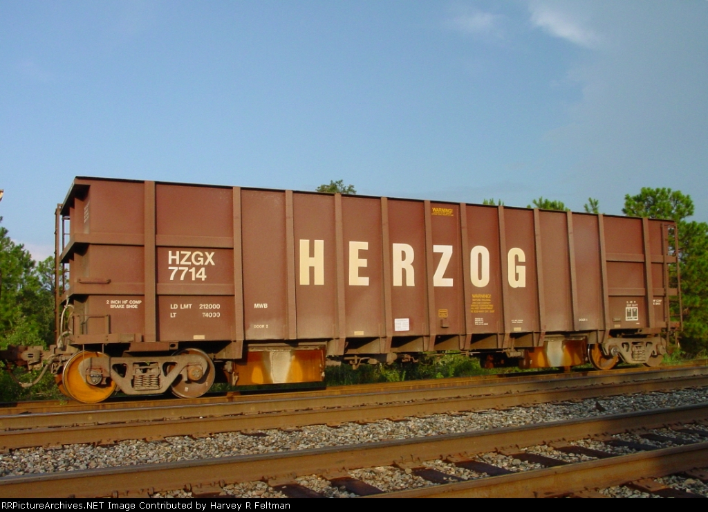 HZGX 7714, destined for ballast loading at either Martin-Marietta or Junction City Mining Company's Junction City, GA production facilities, on the storage track 